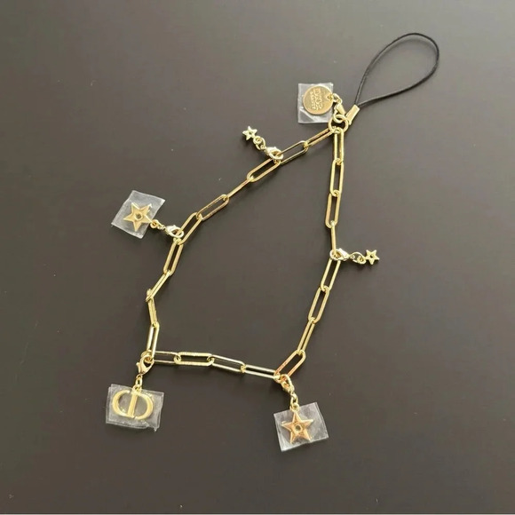 Dior Jewelry - Christian Dior novelty Gold Star logo Strap Chain Charm